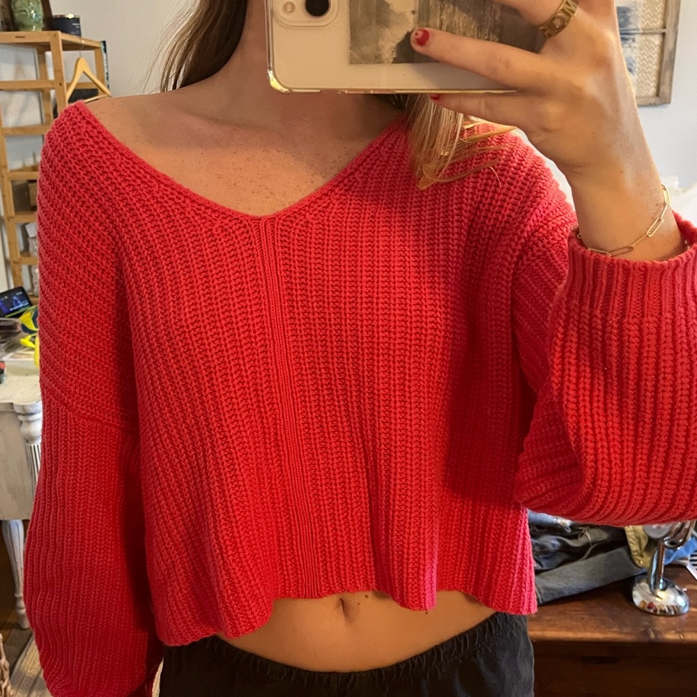 Urban hot pink sweater with open back